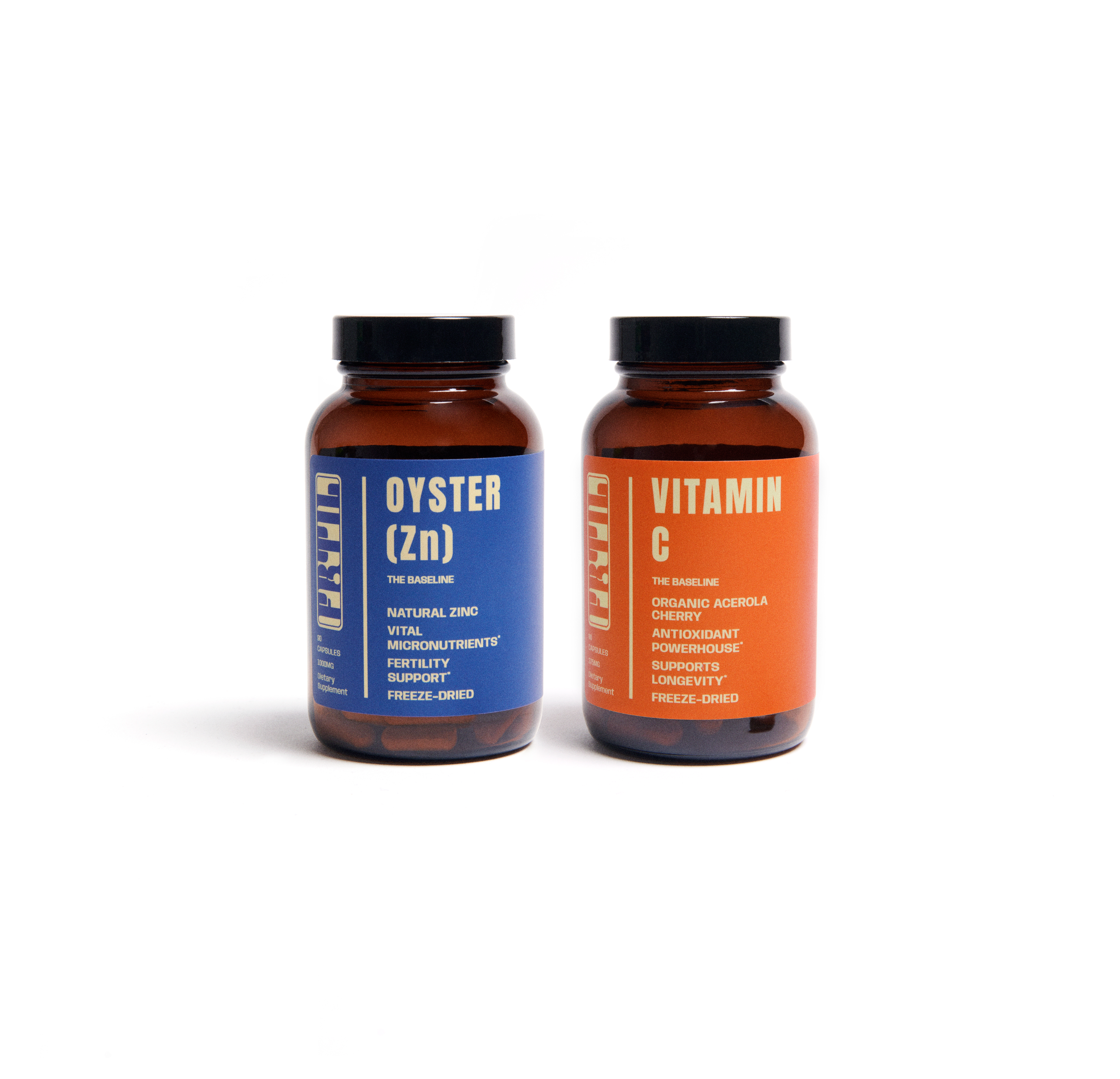 FRTIL Stress Defense bundle featuring Oyster (Zn) and Vitamin C supplements in capsule bottles on a white background.